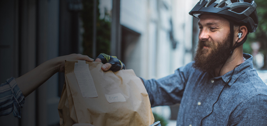 Bicycle messenger delivering food