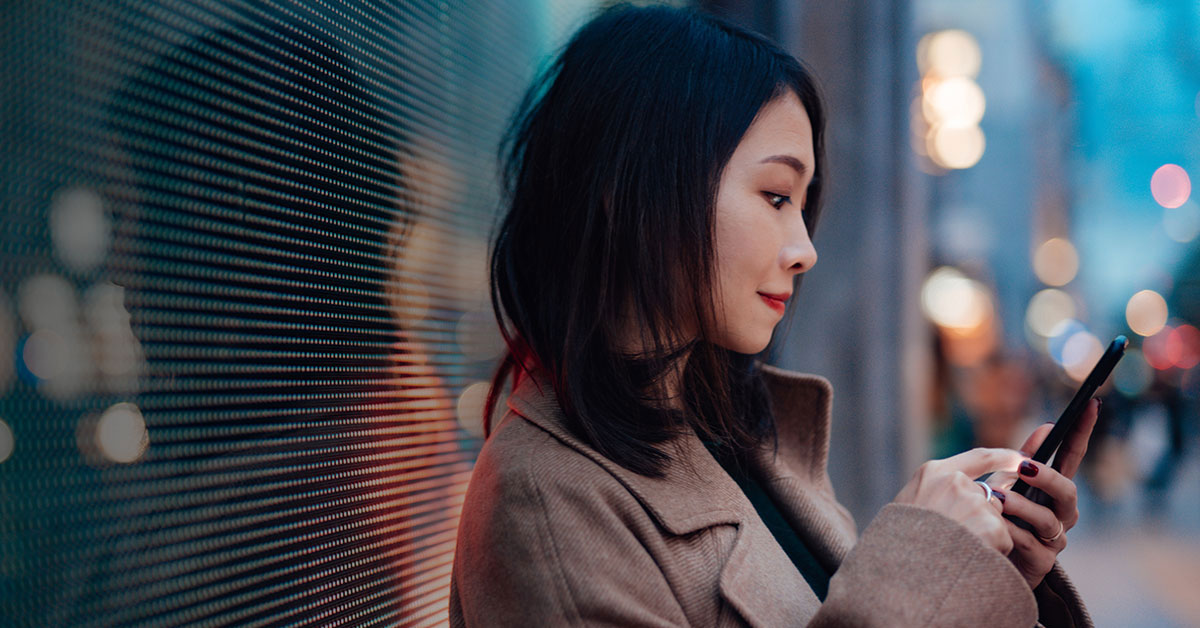 digital payouts woman on phone